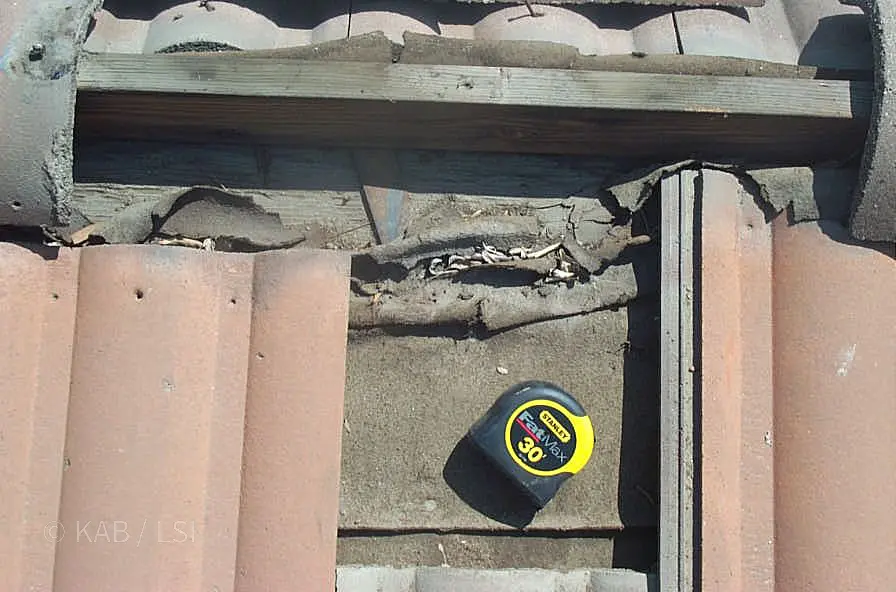 Tile roof leak from UV-damaged underlayment — where tile roofs actually leak, close-up © KAB/LSI