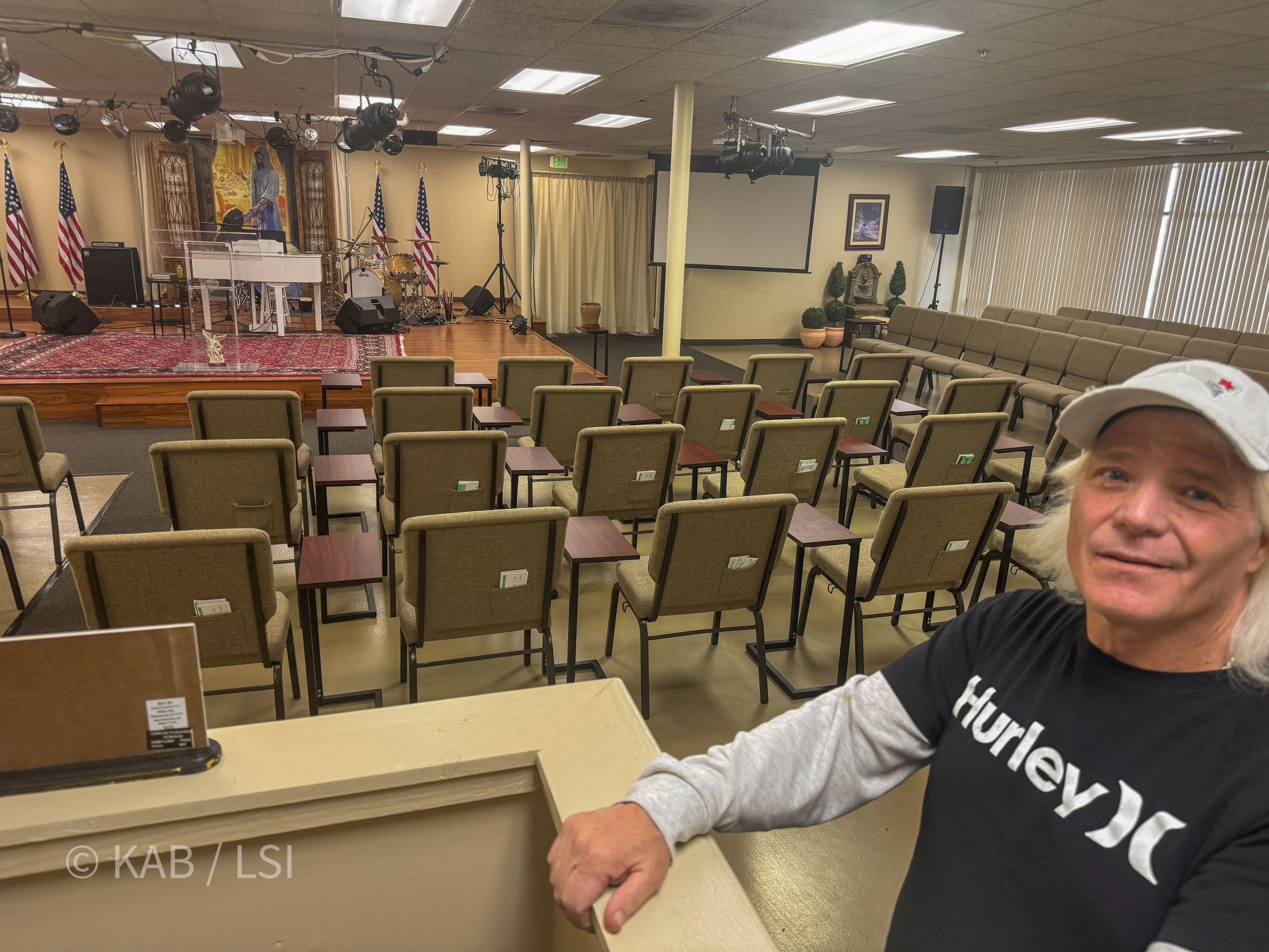 Interior view of the Brand New Life Christian Center sanctuary at 1110 W. Taft Ave., Orange, CA, with longtime church volunteer Jeff Billig in the foreground.