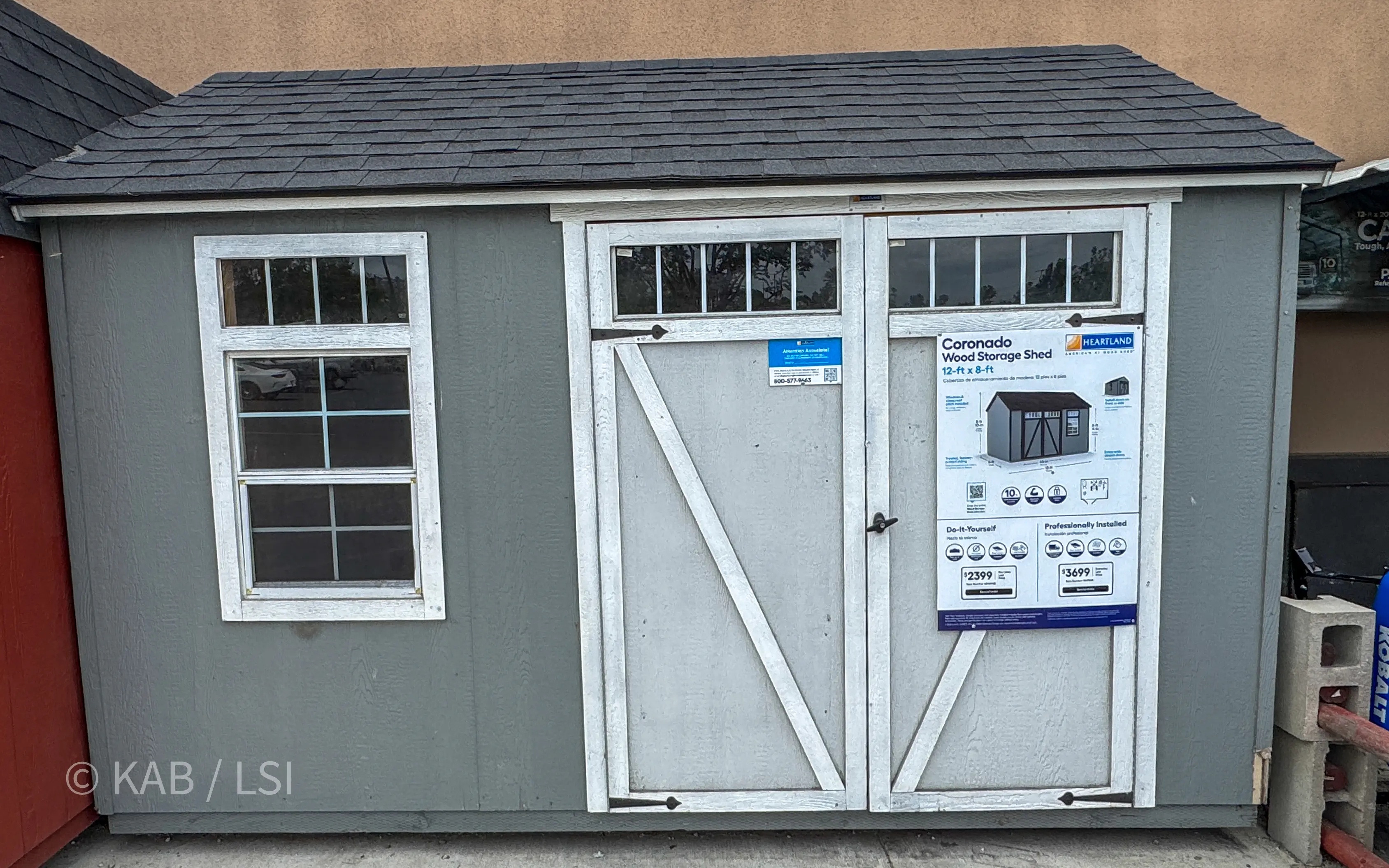 Heartland Coronado 12 by 8 weathered gray wood storage shed on display at Lowes
