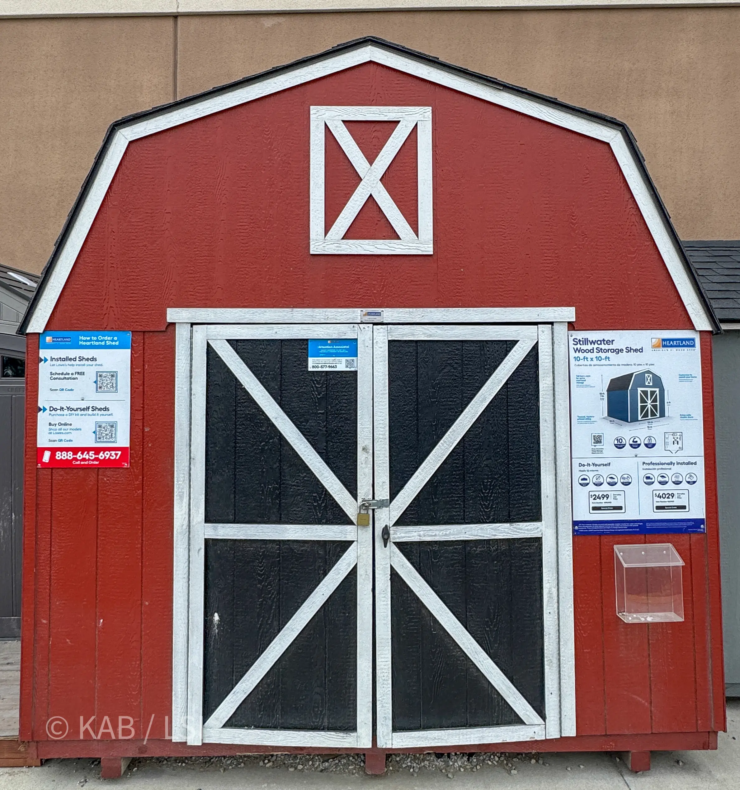 Heartland Stillwater red barn 10 by 10 wood storage shed on display at Lowes