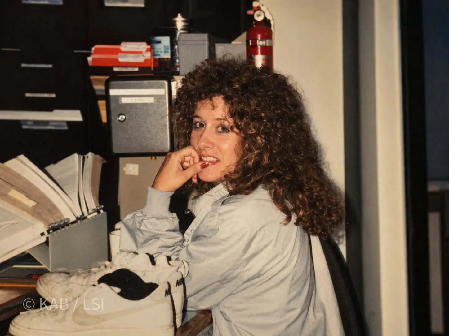 Sherri Bennett in 1986 at the back-office desk of Stewart Properties in Orange County, California.