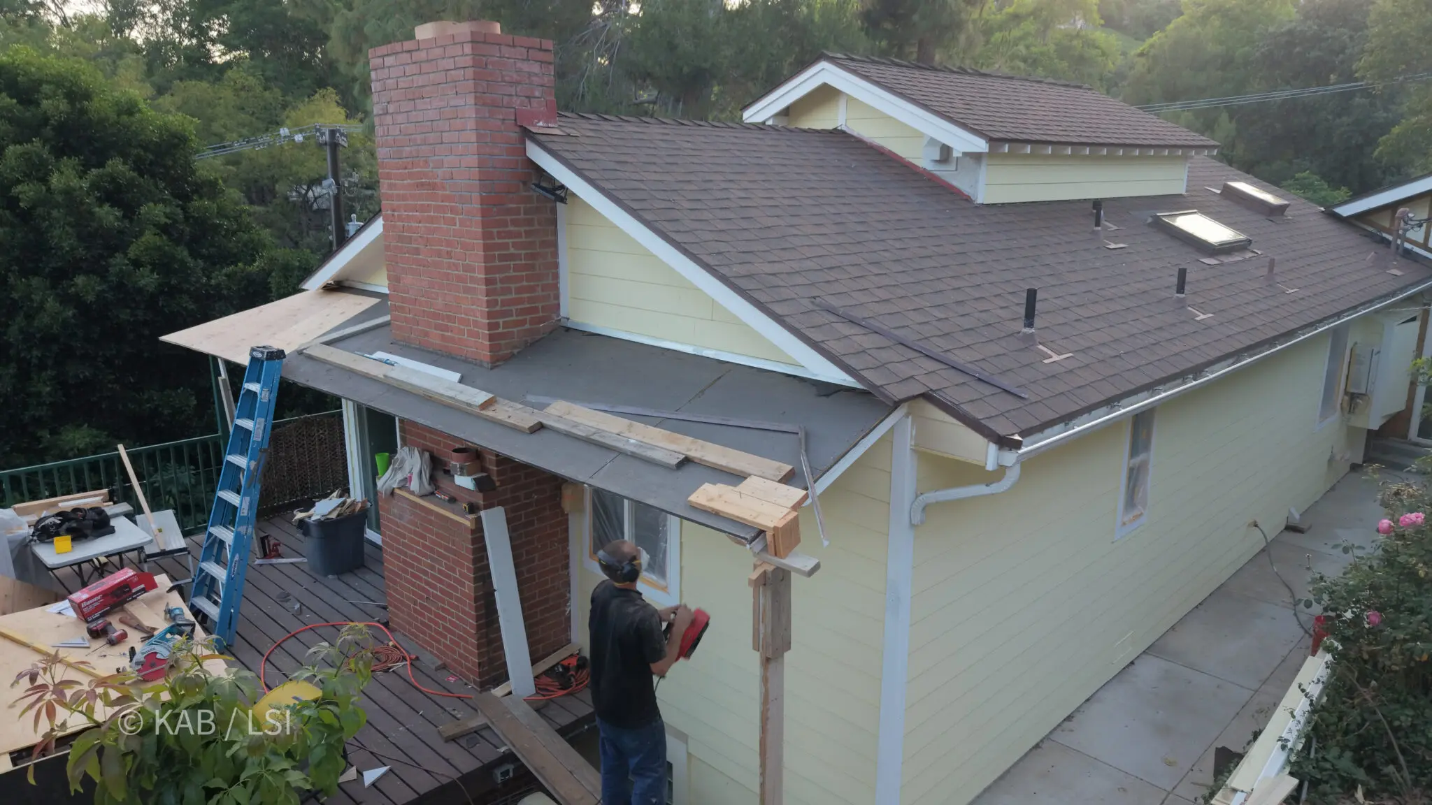 Structural reconstruction of a roof overhang complete before roofing installation