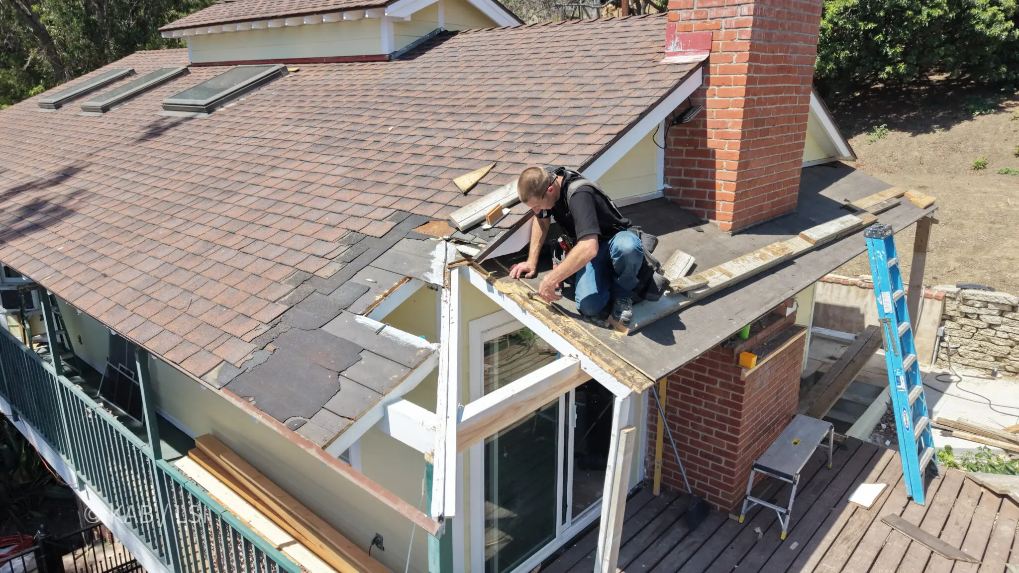 Rebuilding a damaged roof overhang on a hillside home in La Habra Heights