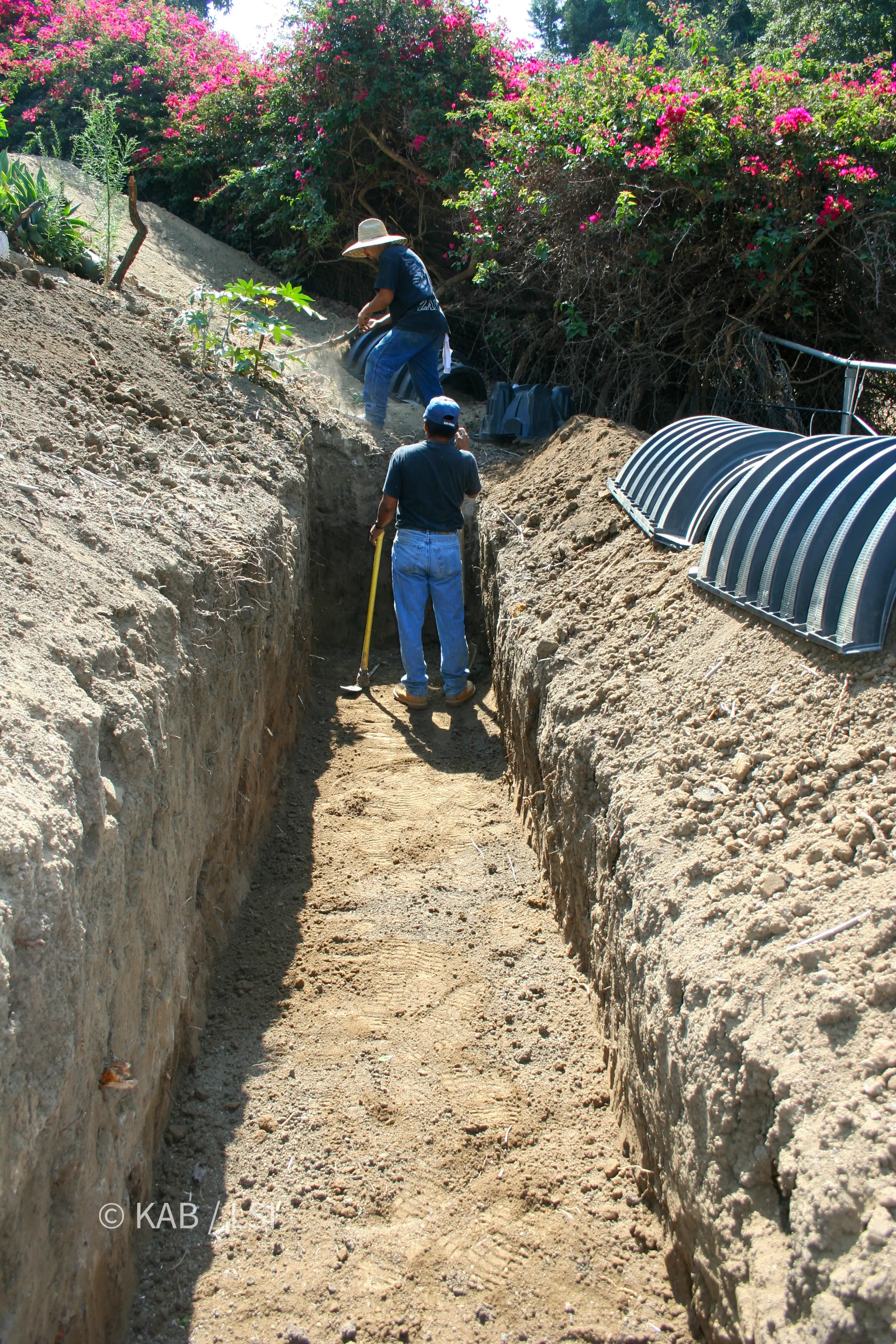 Trench prepared for a modern chamber leach field on a hillside property in La Habra Heights