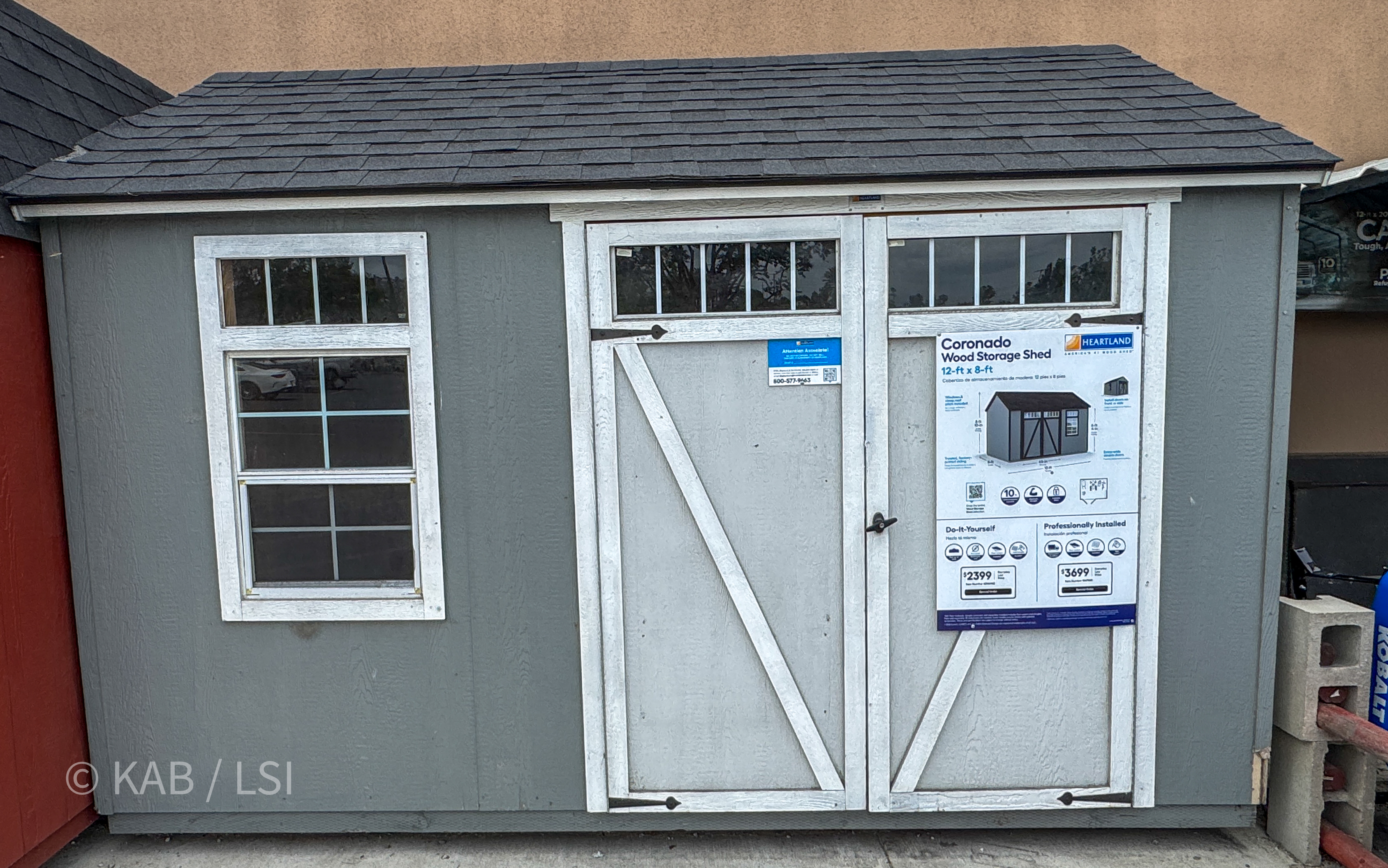 Heartland Coronado 12 by 8 weathered gray wood storage shed on display at Lowes