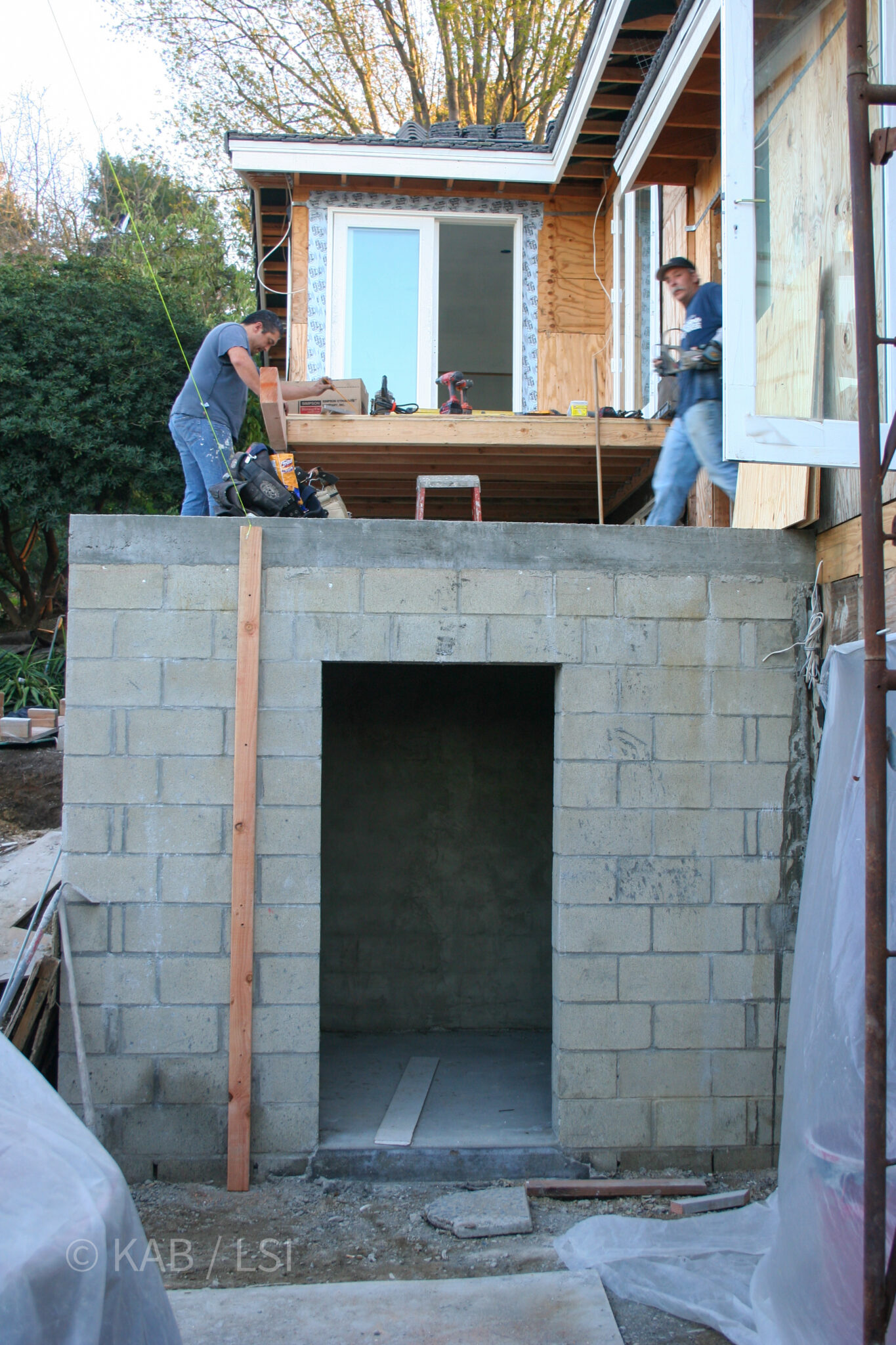 Safe room with poured concrete lid — camouflaged as front porch landing © KAB/LSI