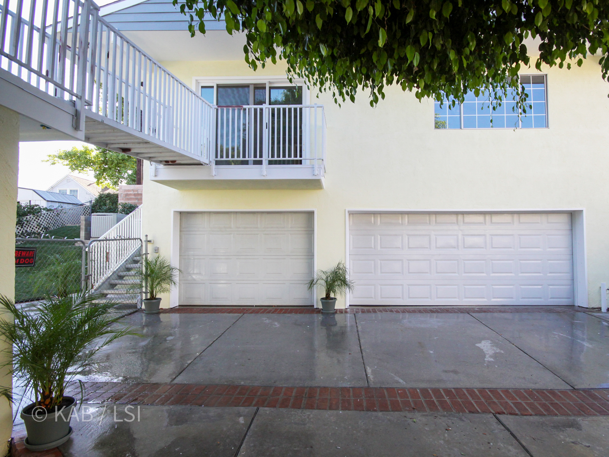 New ADU above 3-car garage — cut into hillside, connected via steel and aluminum bridge, La Habra Heights © KAB/LSI