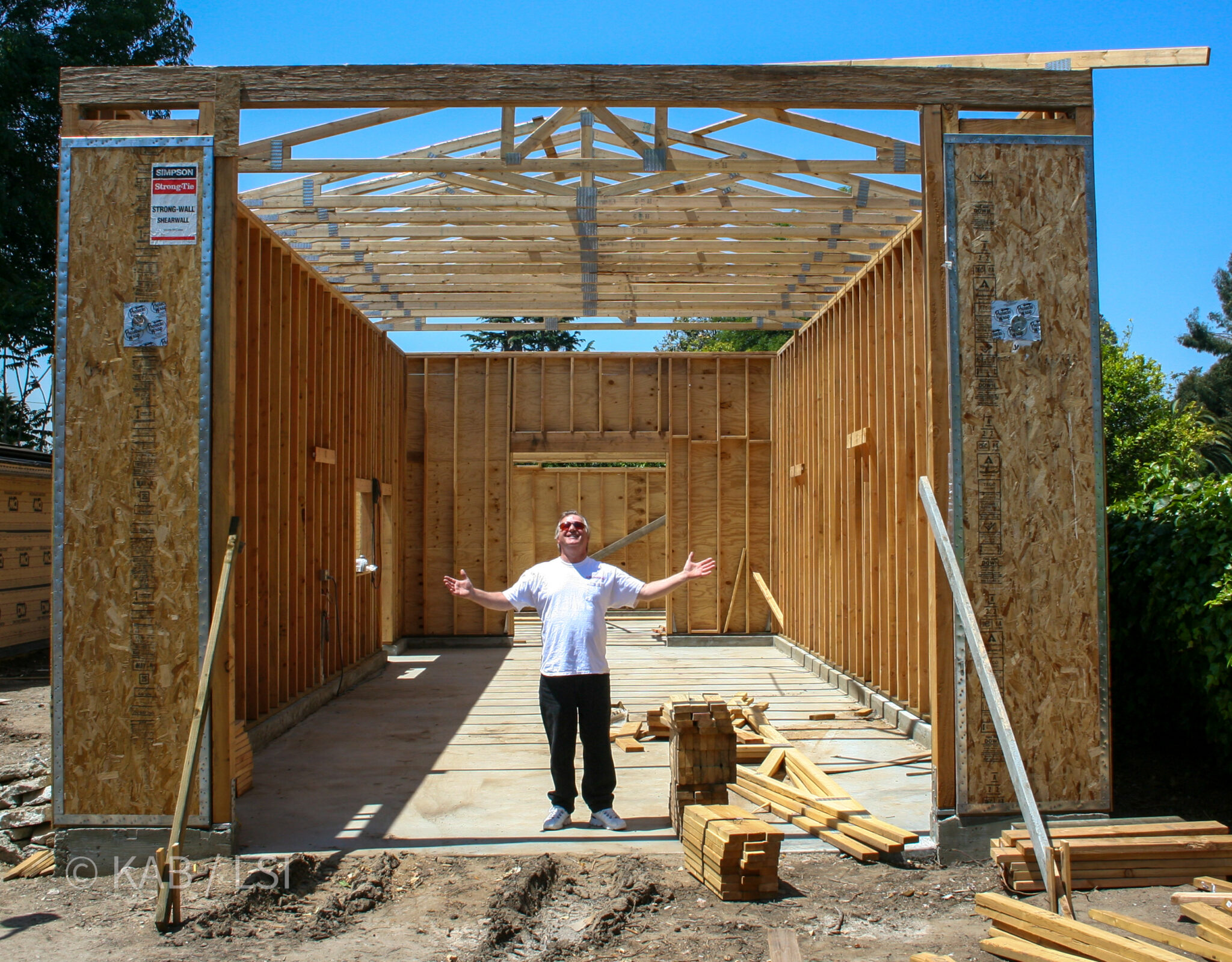 Kenny in the framing of his new RV garage — 20' wide, 60' deep, La Habra Heights © KAB/LSI
